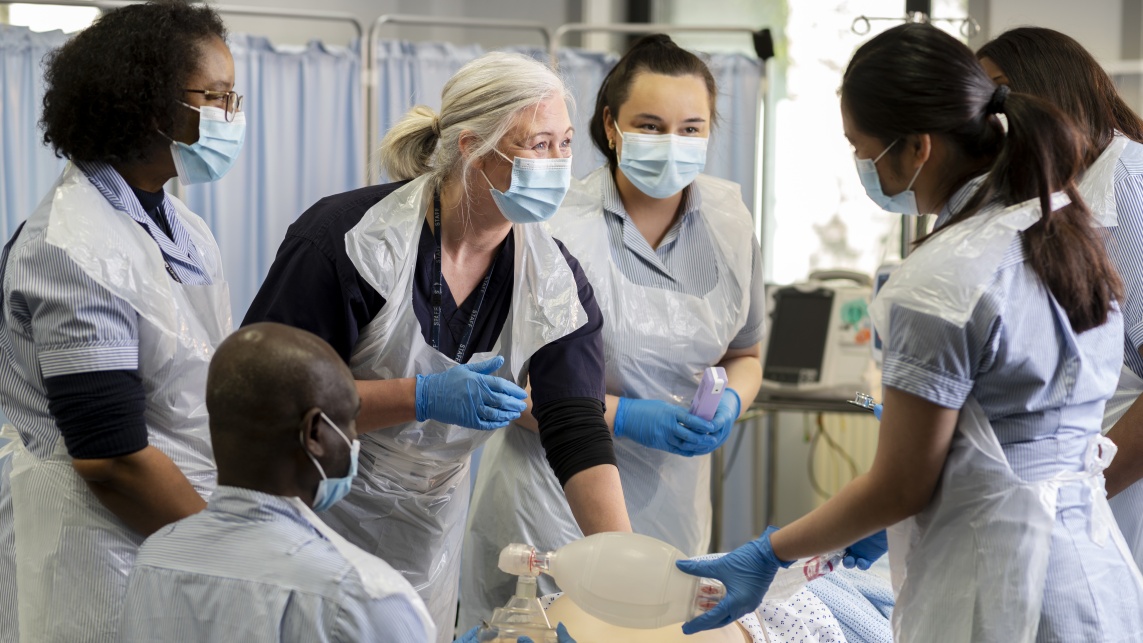 Nursing students and staff training on a simulated ward