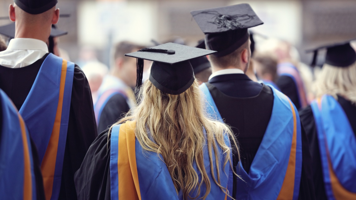 Students in graduation caps and gowns