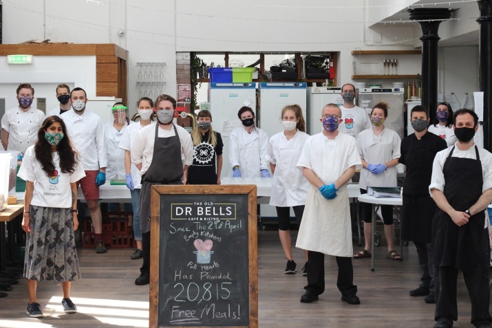 The volunteers from Empty Kitchens, Full Hearts standing together facing the camera