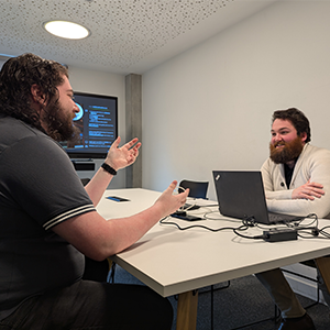 University Staffordshire’s Games Institute mock-interview scheme with two people sitting opposite each other in an interview scenario.
