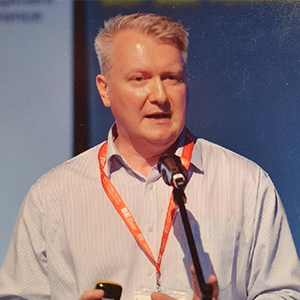 Greg Wade speaking at an event