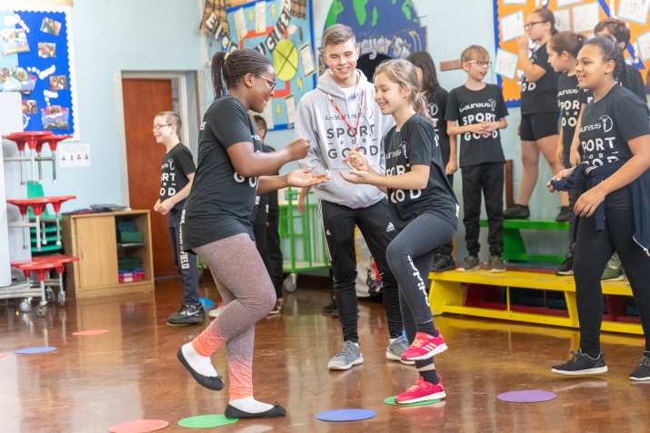 Group of children in a sports lesson 