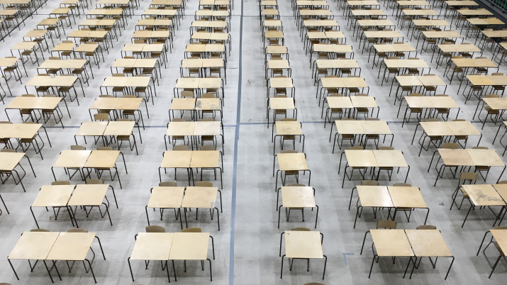 A large, empty exam theatre from above 