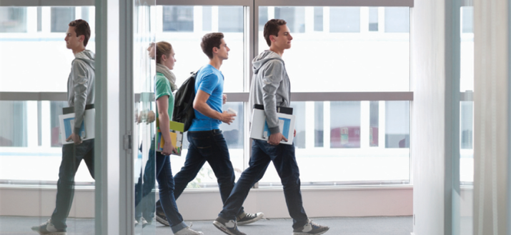 Group of students walking in a corridor