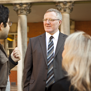 Professor Pal Layzell talking to a student