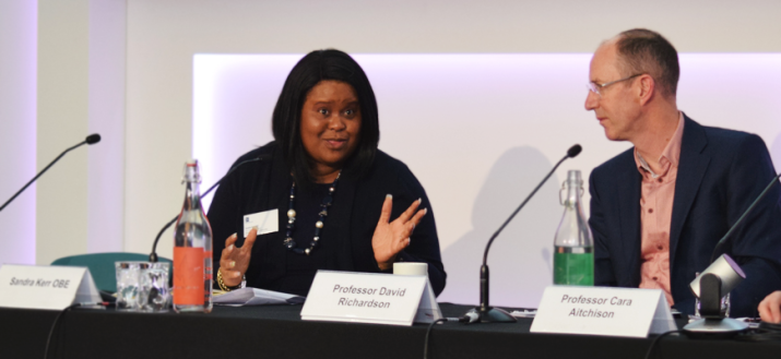 Two people at a conference