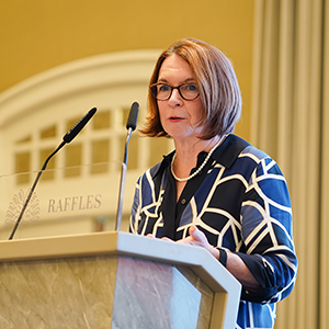 Wendy Thomson at a lectern 