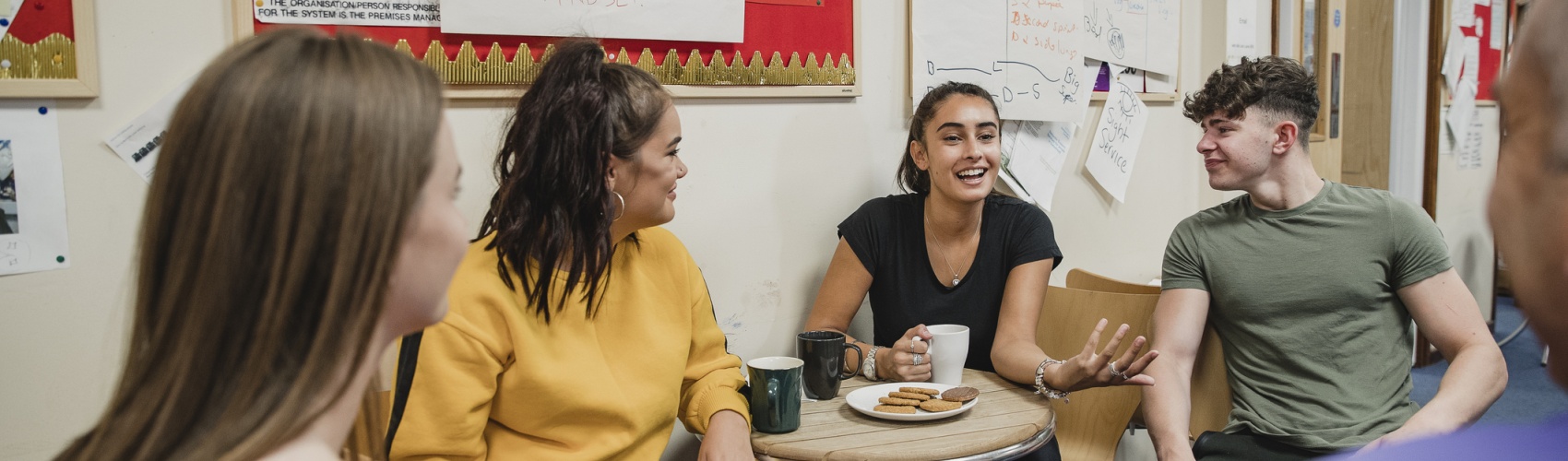 Teenagers Relaxing with Tea at Youth Club