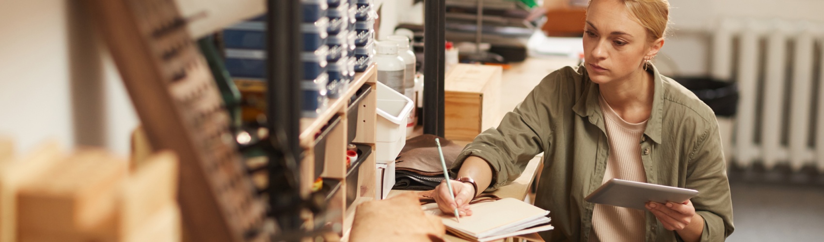 Serious Young Woman In Workshop