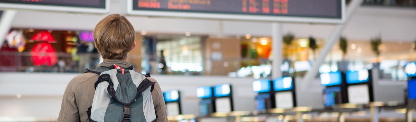 Female checking airline schedule
