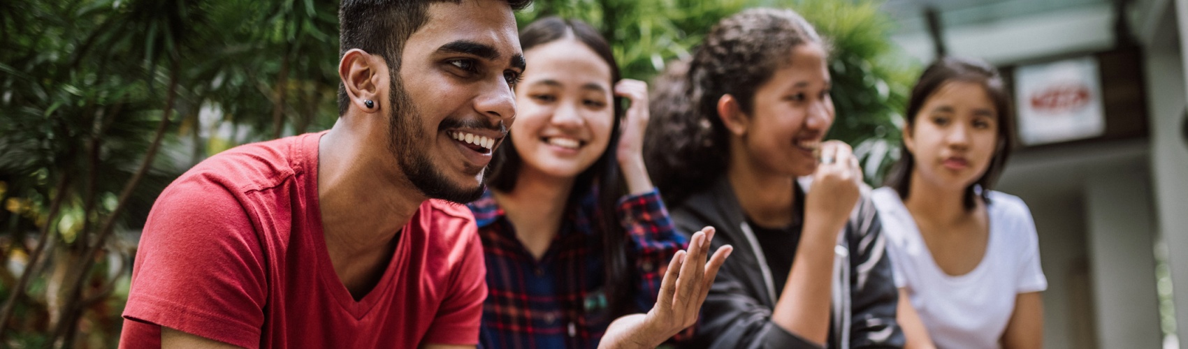 Group Of Students Joking And Getting To Know Each Other