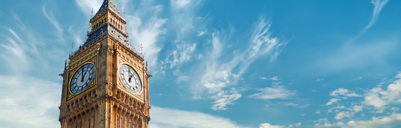 Big Ben Clock Tower in London, UK, on a bright day.