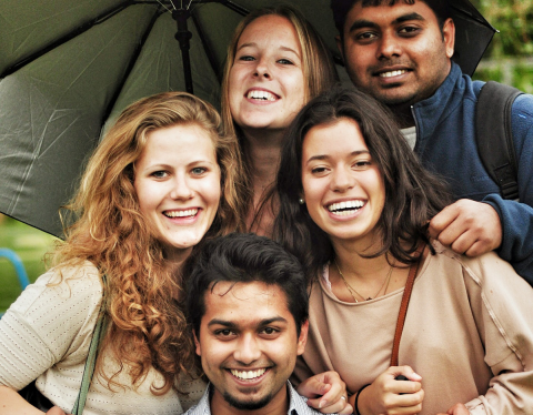 Group of happy, smiling students looking at the camera