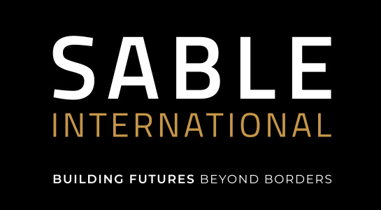 Logo citing: Sable International, Building futures beyond borders